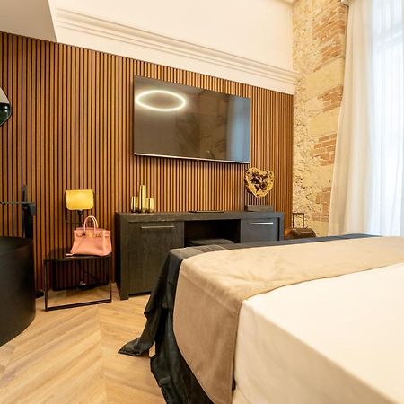 Nero Luxury Suites Cagliari Bagian luar foto