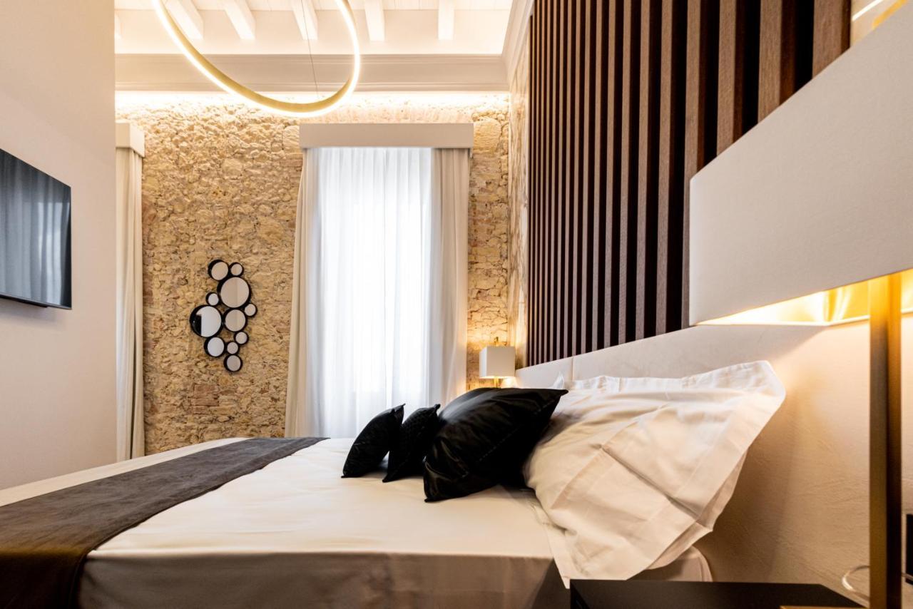 Nero Luxury Suites Cagliari Bagian luar foto