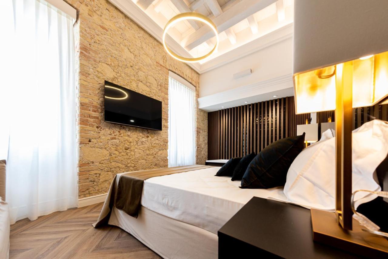 Nero Luxury Suites Cagliari Bagian luar foto